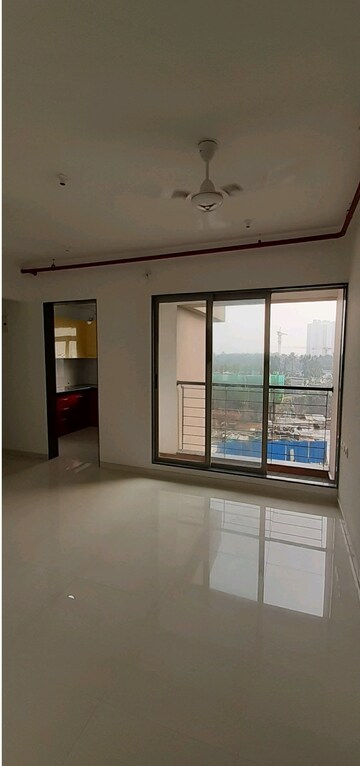 Living Room in 2 BHK Apartment at Runwal Eirene, Balkum Pada – for Rent