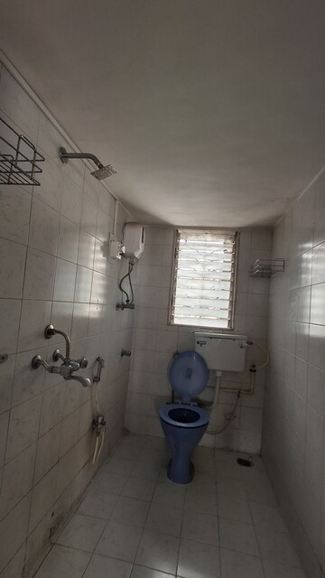 Bathroom in 2 BHK Apartment at Gokul Nagari 1, Kandivali East – for Rent