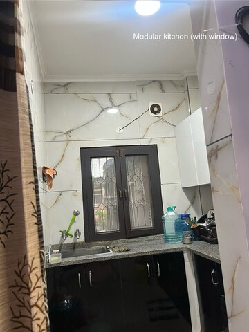 Kitchen in 2 BHK Builder Floor at Esteem Complex, Savitri Nagar – for Rent