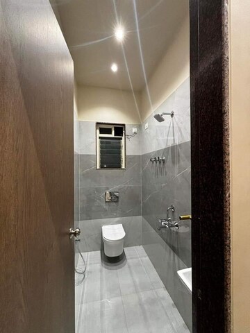 Bathroom in 2 BHK Apartment at Geomatrix Silvercrest, Khanda Colony – for Sale