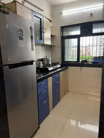 Kitchen in 3 BHK Apartment at Sankalp CHS Kopar Khairane, Kopar Khairane – for Rent