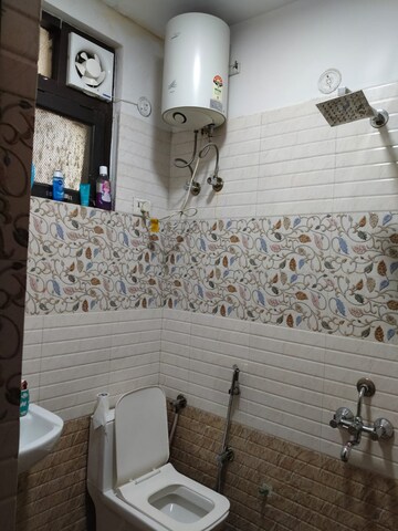 Bathroom in 2 BHK Builder Floor at Shakti Khand iv – for Rent