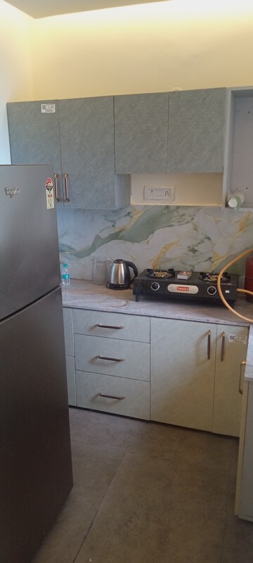 Kitchen in 2 BHK Apartment at Urbtech Xaviers, Sector 168 – for Rent