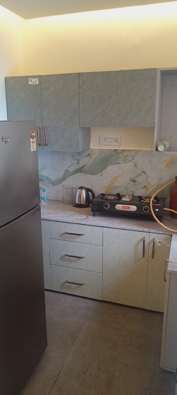 Kitchen in 2 BHK Apartment at Urbtech Xaviers, Sector 168 – for Rent