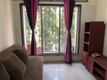 Living Room in 1 BHK Apartment at Bhoomi Hills, Kandivali East – for Rent