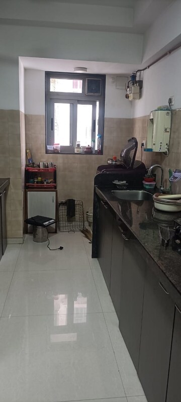 Kitchen in 3 BHK Apartment at Adani Western Heights Sky Apartments, Andheri West – for Rent