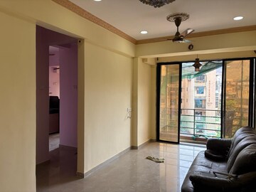 Living Room in 1 BHK Apartment at Valram Payal Park CHS, Karanjade – for Sale