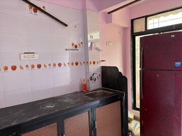Kitchen in 1 BHK Apartment at Valram Payal Park CHS, Karanjade – for Sale