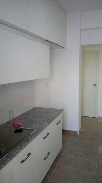 Kitchen in 3 BHK Apartment at DLF Westend Heights New Town, Akshayanagar – for Rent