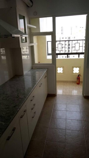 Kitchen in 3 BHK Apartment at DLF Westend Heights New Town, Akshayanagar – for Rent