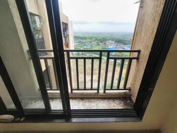 Balcony in 1 BHK Apartment at Raunak Unnathi Woods Phase 7 A And B, Ghodbunder Road – for Sale