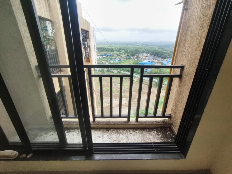 Balcony, raunak-unnathi-woods-phase-7-a-and-b 1 Bedroom 421 Sq.Ft. Apartment In Ghodbunder Road Thane 9050814