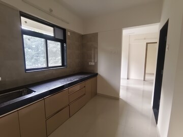 Kitchen in 2 BHK Apartment at K M Horizon Palms III, Owale – for Rent