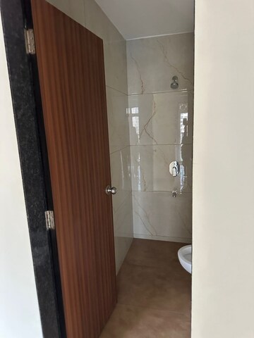 Bathroom in 1 BHK Apartment at Raunak Bliss, Ghodbunder Road – for Rent