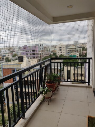 Balcony in 3 BHK Apartment at SMR Vinay Boulder Woods, Bandlaguda Jagir – for Rent