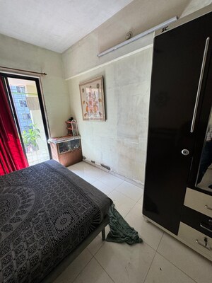 Bedroom in 3 BHK Apartment at Balaji Shriji Apartment CHS, Kopar Khairane – for Sale