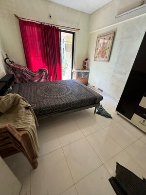 Living Room in 3 BHK Apartment at Balaji Shriji Apartment CHS, Kopar Khairane – for Sale