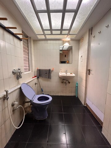 Bathroom in 2 BHK Apartment at Hiranandani Garden Eden 2, Powai – for Rent