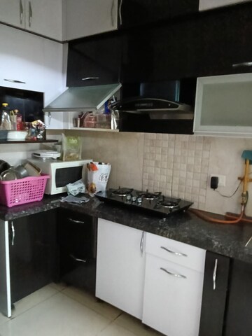 Kitchen in 2 BHK Apartment at Mahagun Mywoods, Sector 16c Greater Noida – for Sale