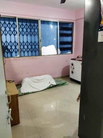 Living Room in 1 BHK Apartment at Vanaz Corner, Kothrud – for Rent