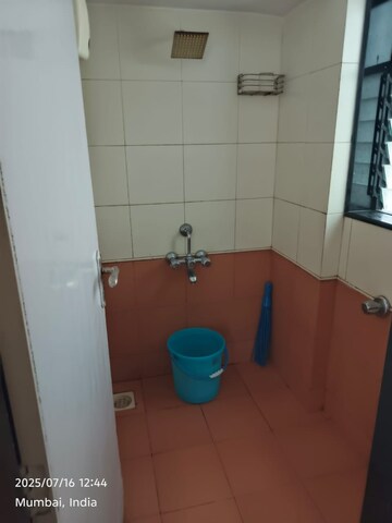 Bathroom in 1 BHK Apartment at Je And Vee Om Trimurti, Malad East – for Sale