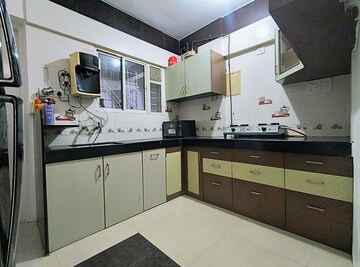 Kitchen in 2 BHK Apartment at Mount N Glory, Kharadi – for Rent