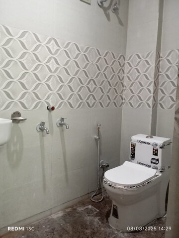 Bathroom in 1 BHK Builder Floor at Esteem Complex, Savitri Nagar – for Rent