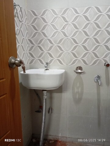 Bathroom in 1 BHK Builder Floor at Esteem Complex, Savitri Nagar – for Rent