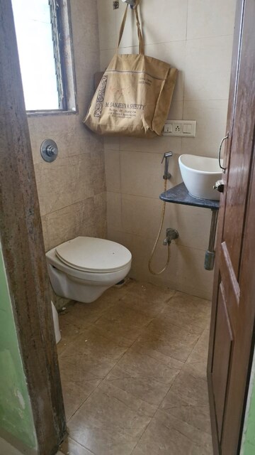 Bathroom in 1 BHK Apartment at Deepak Daffodils, Andheri East – for Rent