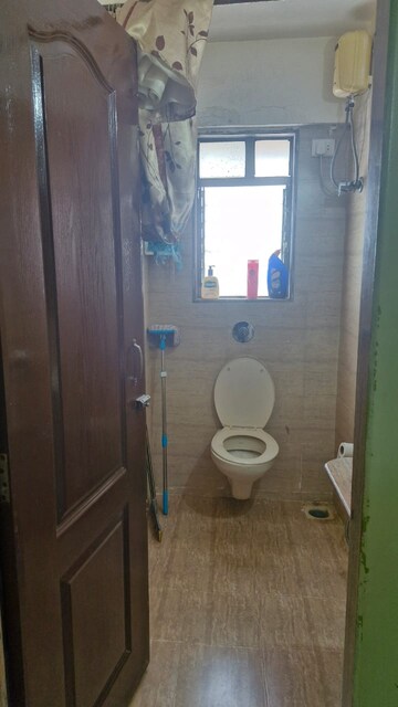 Bathroom in 1 BHK Apartment at Deepak Daffodils, Andheri East – for Rent