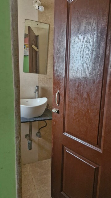 Bathroom in 1 BHK Apartment at Deepak Daffodils, Andheri East – for Rent
