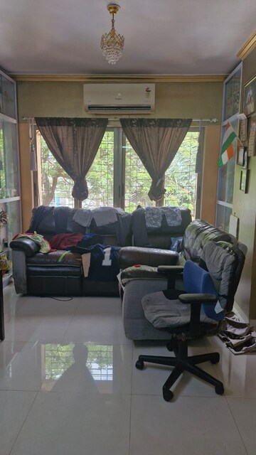 Living Room in 1 BHK Apartment at Deepak Daffodils, Andheri East – for Rent