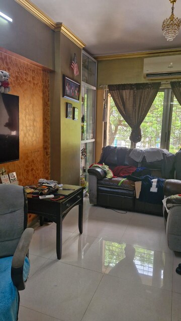 Living Room in 1 BHK Apartment at Deepak Daffodils, Andheri East – for Rent