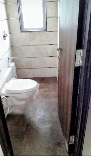 Bathroom in 2 BHK Apartment at Je And Vee Om Trimurti, Malad East – for Rent
