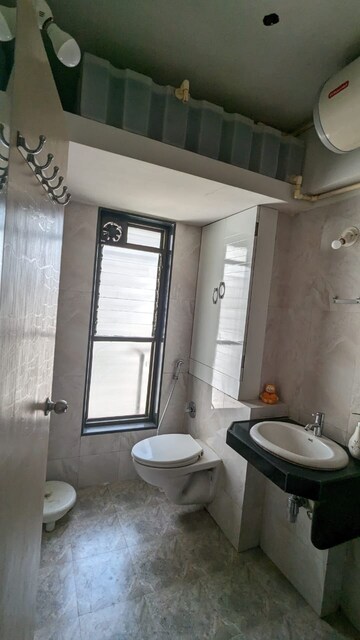 Bathroom in 3 BHK Apartment at Bajaj Enchante Panchsheel CHS, Andheri West – for Rent
