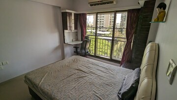Bedroom in 3 BHK Apartment at Bajaj Enchante Panchsheel CHS, Andheri West – for Rent