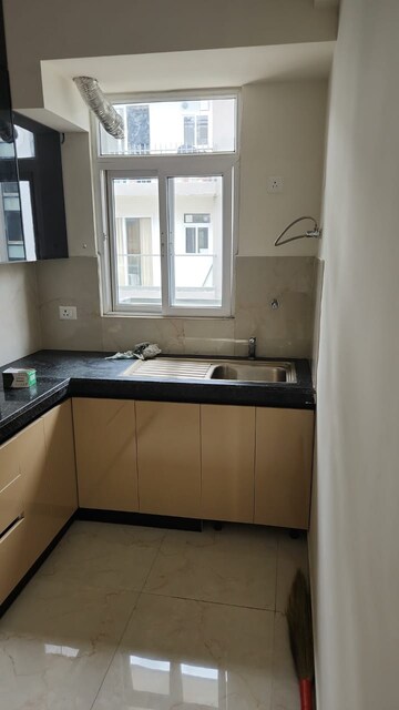 Kitchen in 2 BHK Apartment at Smart World Gems, Sector 89 – for Rent