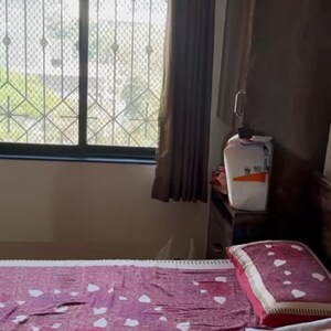 Bedroom in 2 BHK Apartment at Kandivali East – for Sale