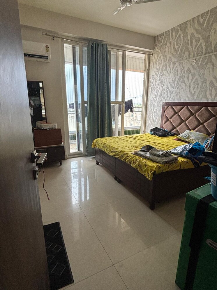 Bedroom, maya-green-lotus-saksham 4 Bedroom 1950 Sq.Ft. Apartment In International Airport Road Zirakpur 9051534