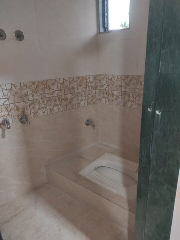 Bathroom in 1.5 BHK Apartment at ARA Swaminarayan Dham, Kurla West – for Rent