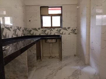 Kitchen in 1.5 BHK Apartment at ARA Swaminarayan Dham, Kurla West – for Rent