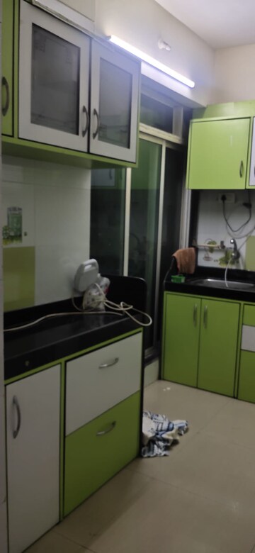 Kitchen in 3 BHK Apartment at Newa Garden, Airoli Sector 20 – for Rent