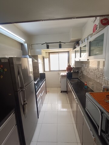 Kitchen in 1.5 BHK Apartment at Seawoods – for Rent