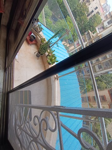 Balcony in 1.5 BHK Apartment at Seawoods – for Rent