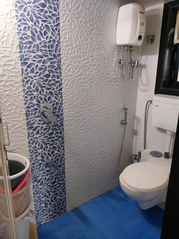 Bathroom in 2 BHK Apartment at Shreeji Tower, Panchsheel Nagar – for Sale