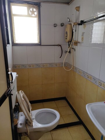 Bathroom in 2 BHK Apartment at Malini Apartment, Andheri East – for Rent