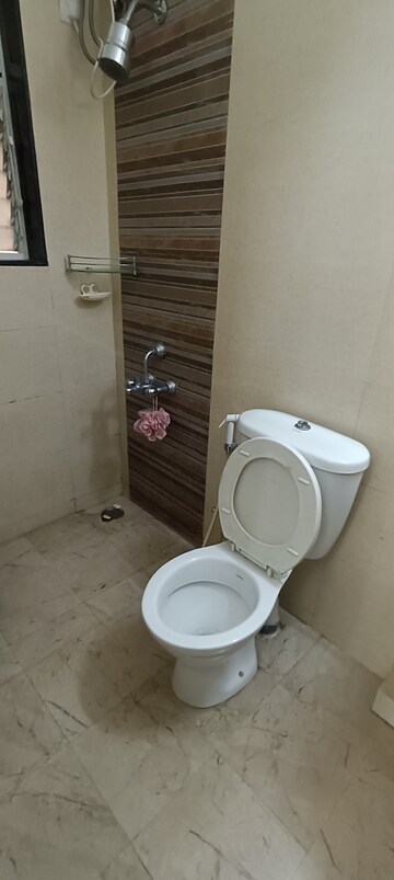 Bathroom in 1 BHK Apartment at Spring Grove Uno Society, Kandivali East – for Rent