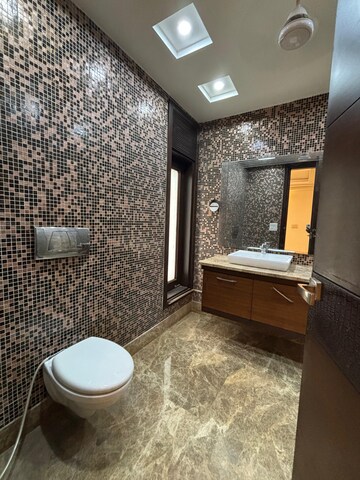 Bathroom in 4 BHK Builder Floor at Green Park Extension – for Rent