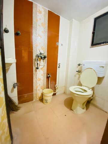 Bathroom in 2 BHK Apartment at Kailas Jyoti Chs, Dombivli West – for Rent