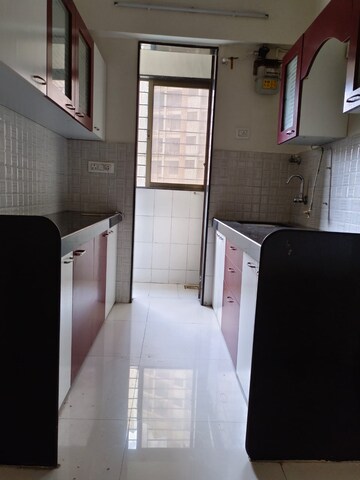 Kitchen in 1 BHK Apartment at Bhoomi Acres, Waghbil – for Rent